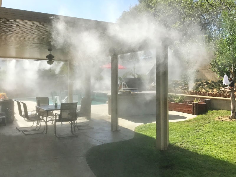 misting system in backyard patio